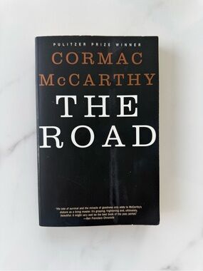 The Road by Cormac McCarthy paperback book